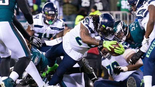 Seattle Seahawks running back Marshawn Lynch (24) scores a touchdown against the Philadelphia Eagles during the second quarter in a NFC Wild Card playoff football game at Lincoln Financial Field.